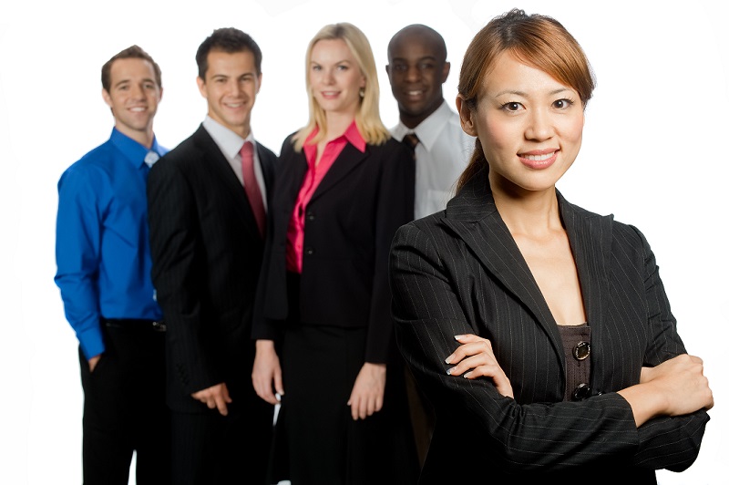 Chinese woman in diverse team.